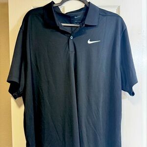 Nike black dri-fit polo shirt. Collar & buttons. XLg EUC 
100% polyester
